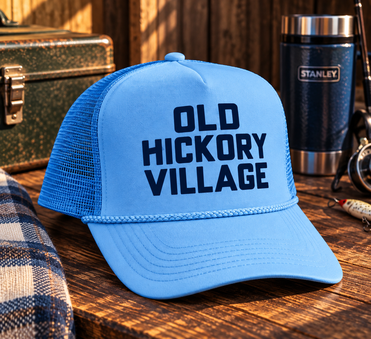 Local Villager Trucker hat in sky blue with Old Hickory Village graphic